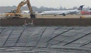 Geotextile Liner installed with plane in background